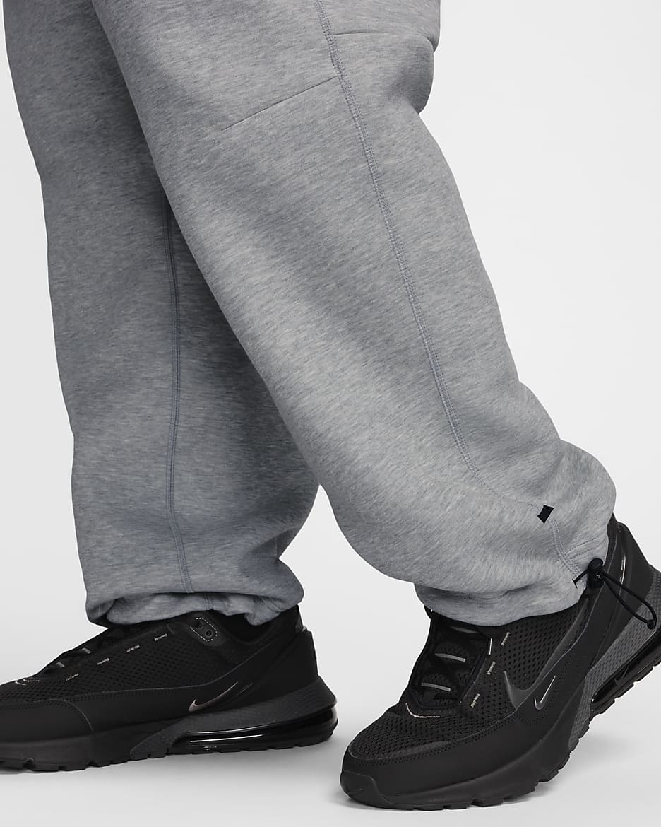 Nike tech open hem pants on sale